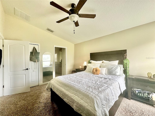 1474 Lakeside Ave, Davenport, FL 33837 - bedroom with lofted ceiling, carpet, ceiling fan, and a textured ceiling