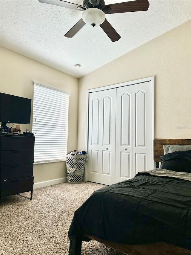 1474 Lakeside Ave, Davenport, FL 33837 - bedroom featuring a closet, carpet floors, ceiling fan, and baseboards