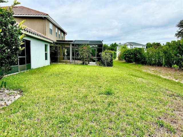 1474 Lakeside Ave, Davenport, FL 33837 - view of grassy yard with glass enclosure