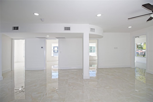 4324 Garden Ave, West Palm Beach, FL 33405 - unfurnished room featuring a ceiling fan, healthy amount of natural light, recessed lighting, light marble finish floors, and a smoke detector