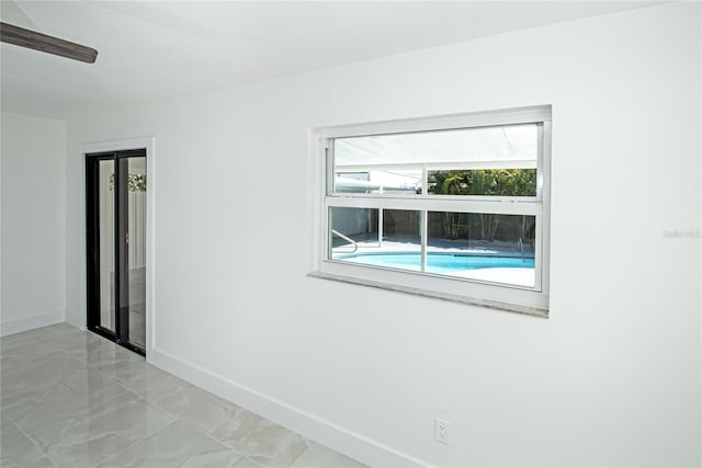 4324 Garden Ave, West Palm Beach, FL 33405 - unfurnished room with baseboards and light marble finish floors