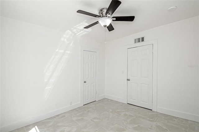 4324 Garden Ave, West Palm Beach, FL 33405 - spare room featuring baseboards, a ceiling fan, and light marble finish floors