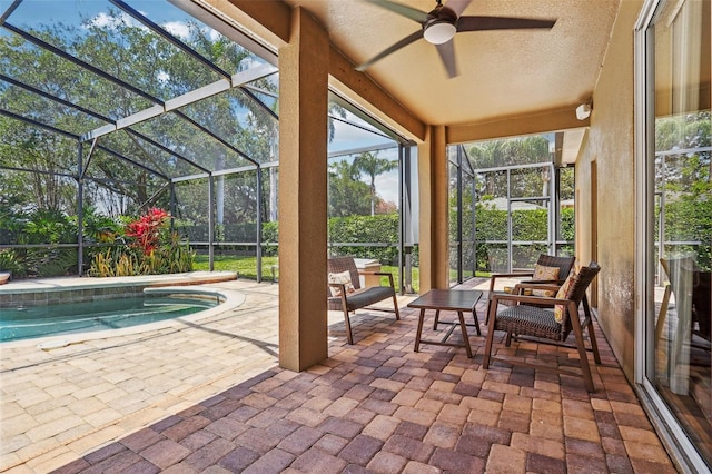 sunroom / solarium with a swimming pool, ceiling fan, and outdoor lounge area