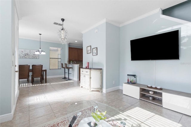 1978 Fishtail Fern Way, Ocoee, FL 34761 - living area featuring a chandelier, crown molding, baseboards, and light tile patterned floors