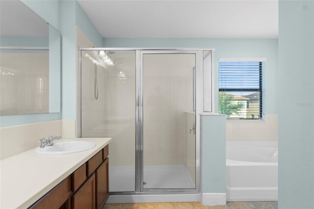 1978 Fishtail Fern Way, Ocoee, FL 34761 - full bathroom featuring a shower stall, vanity, and a bath