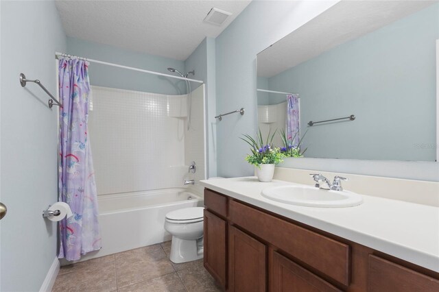 1978 Fishtail Fern Way, Ocoee, FL 34761 - bathroom with toilet, vanity, tile patterned flooring, and shower / tub combo