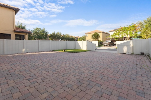 1978 Fishtail Fern Way, Ocoee, FL 34761 - view of patio / terrace featuring a fenced backyard and a gate