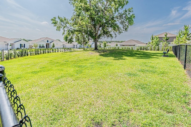 view of yard featuring a residential view