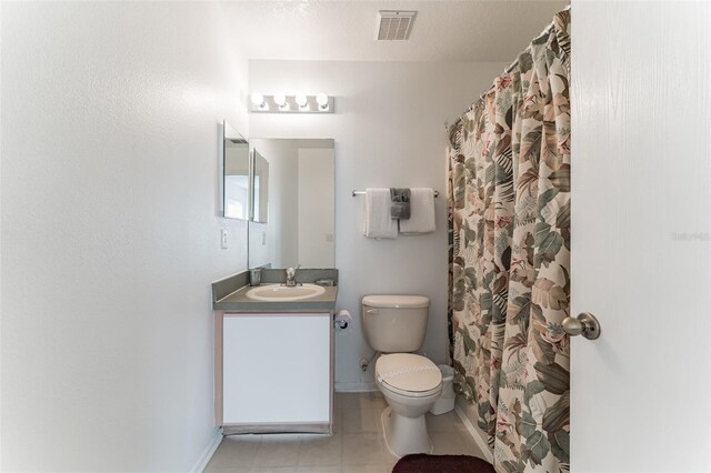 full bath with toilet, tile patterned floors, baseboards, vanity, and a shower with curtain
