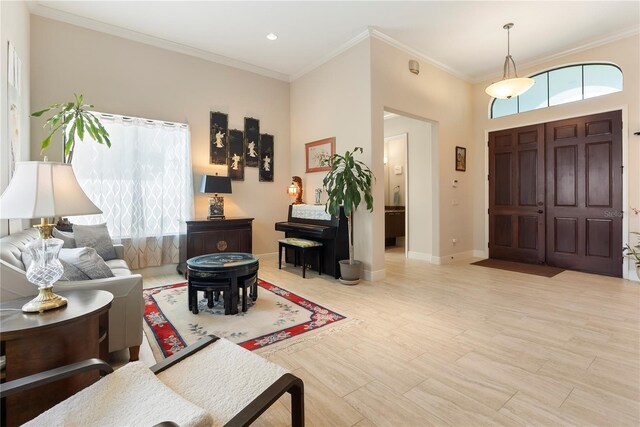 11706 Waterstone Loop Dr, Windermere, FL 34786 - living area featuring crown molding, baseboards, recessed lighting, and a towering ceiling