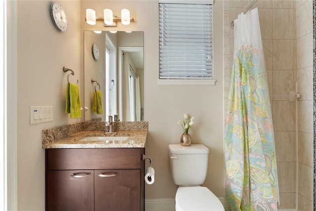11706 Waterstone Loop Dr, Windermere, FL 34786 - bathroom with toilet, vanity, and tiled shower