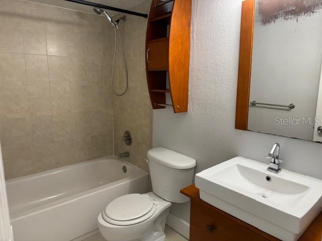 900 S Peninsula Dr Unit 208, Daytona Beach, FL 32118 - full bath with toilet,  shower combination, and vanity