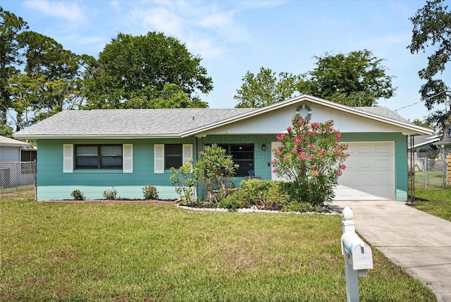 ranch-style home with driveway, an attached garage, and a shingled roof