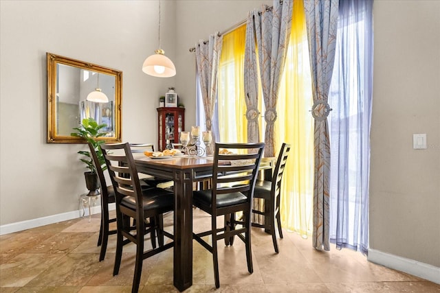 16 Sawfish Ct, Kissimmee, FL 34759 - dining area with baseboards