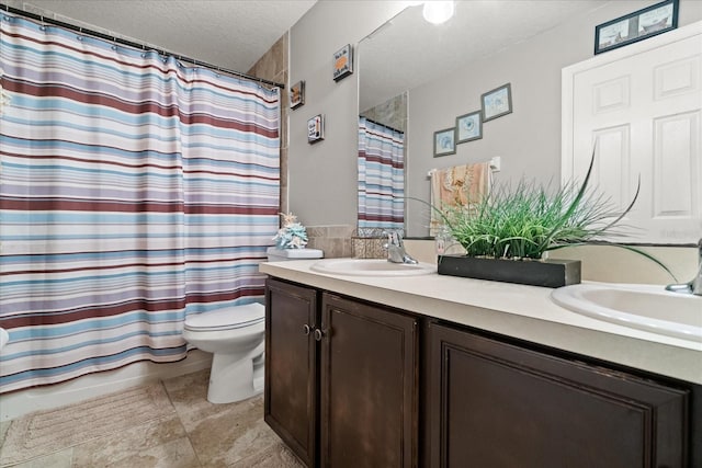 16 Sawfish Ct, Kissimmee, FL 34759 - full bath featuring toilet, double vanity, a textured ceiling, tile patterned floors, and shower / tub combo with curtain