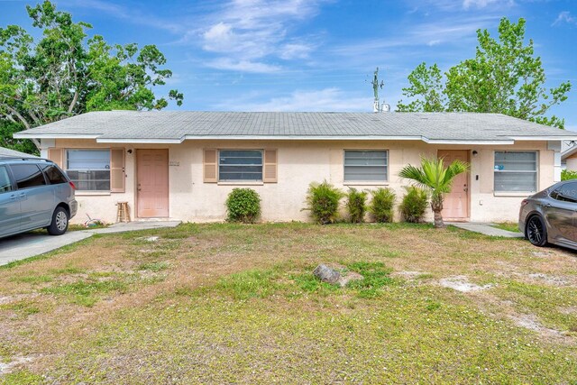 6524/6526 12th St W, Bradenton, FL 34207 - single story home featuring stucco siding and a front yard