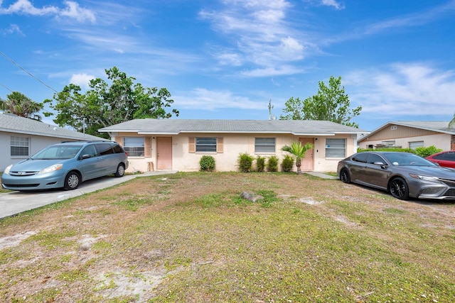 6524/6526 12th St W, Bradenton, FL 34207 - view of front of property with stucco siding and a front yard