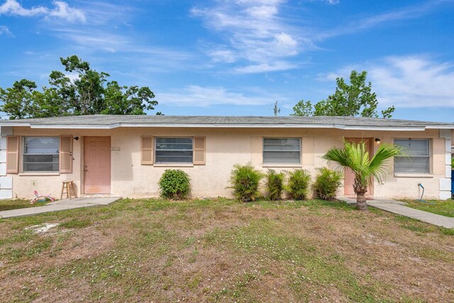 6524/6526 12th St W, Bradenton, FL 34207 - view of front of property with a front lawn and stucco siding