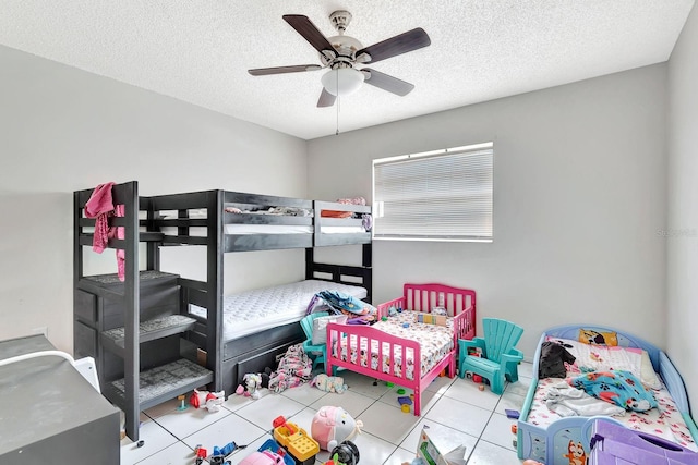 6524/6526 12th St W, Bradenton, FL 34207 - tiled bedroom featuring a textured ceiling and ceiling fan