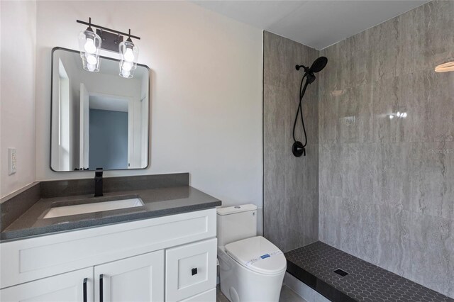 17 S Flag Ct, Kissimmee, FL 34759 - full bath featuring a tile shower, vanity, and toilet