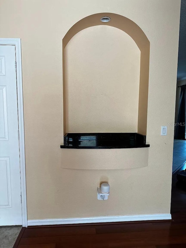 12610 Sawgrass Oak St, Orlando, FL 32824 - detailed view of wood finished floors and baseboards