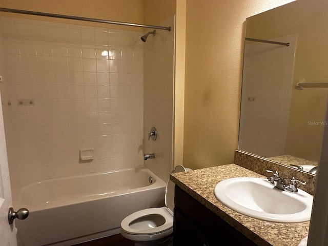 12610 Sawgrass Oak St, Orlando, FL 32824 - bathroom with toilet, bathtub / shower combination, a textured wall, and vanity