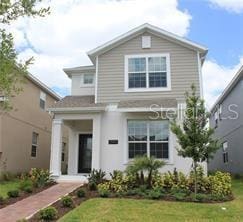 11941 Sonnet Ave, Orlando, FL 32832 - view of front of property featuring a front lawn