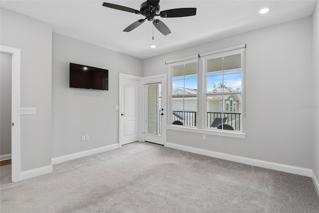 117 E Concord St Unit 7, Orlando, FL 32801 - unfurnished room featuring light carpet, baseboards, and recessed lighting