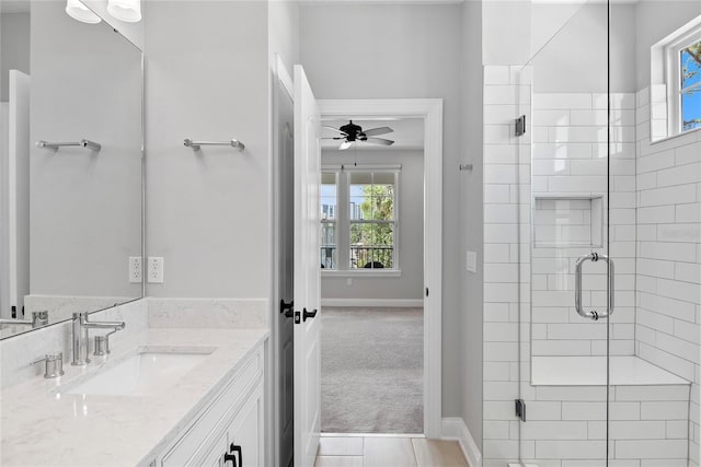 117 E Concord St Unit 7, Orlando, FL 32801 - bathroom featuring a shower stall, healthy amount of natural light, and a ceiling fan
