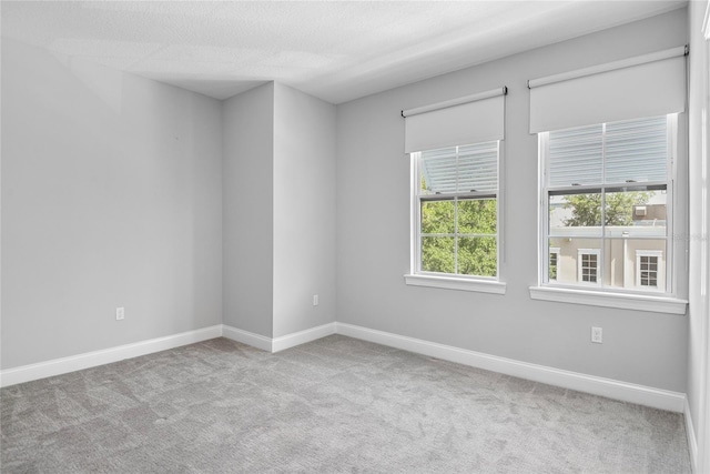 117 E Concord St Unit 7, Orlando, FL 32801 - carpeted spare room featuring baseboards