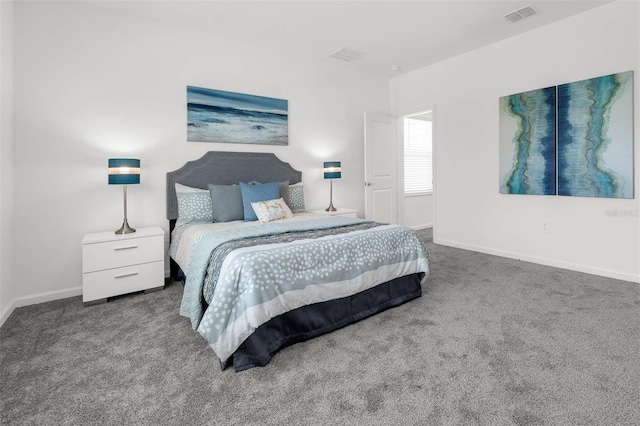 bedroom with carpet and baseboards