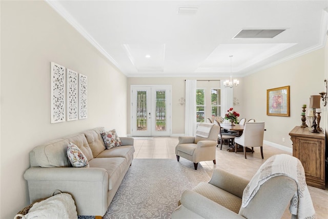 31754 Red Tail Blvd, Sorrento, FL 32776 - living room with ornamental molding, a raised ceiling, a chandelier, and baseboards