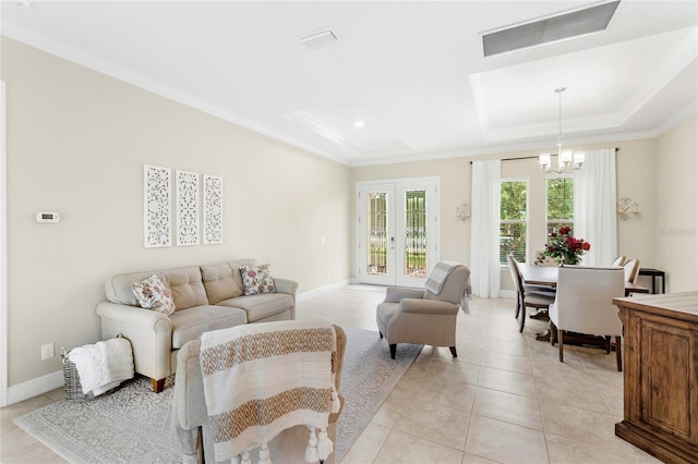 31754 Red Tail Blvd, Sorrento, FL 32776 - living area featuring a raised ceiling, a chandelier, crown molding, baseboards, and light tile patterned floors