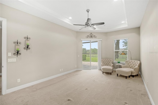 31754 Red Tail Blvd, Sorrento, FL 32776 - living area with ceiling fan, a tray ceiling, carpet flooring, recessed lighting, and baseboards