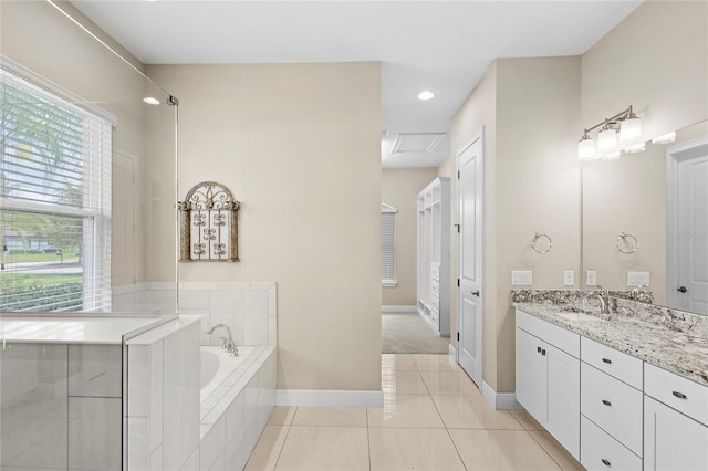 31754 Red Tail Blvd, Sorrento, FL 32776 - bathroom with a bath, vanity, baseboards, tile patterned flooring, and recessed lighting