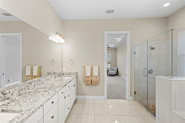 31754 Red Tail Blvd, Sorrento, FL 32776 - full bathroom with a stall shower, double vanity, tile patterned floors, baseboards, and recessed lighting