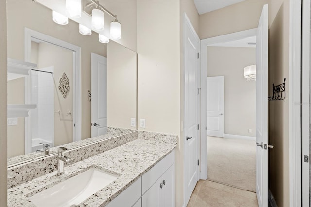 31754 Red Tail Blvd, Sorrento, FL 32776 - bathroom featuring vanity, tile patterned floors, baseboards, and a shower