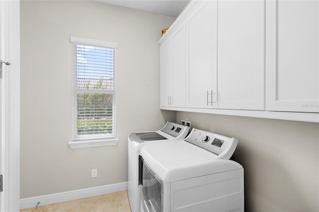 31754 Red Tail Blvd, Sorrento, FL 32776 - washroom with separate washer and dryer, cabinet space, plenty of natural light, and baseboards