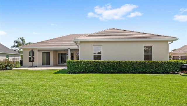 31754 Red Tail Blvd, Sorrento, FL 32776 - back of house featuring stucco siding and a patio