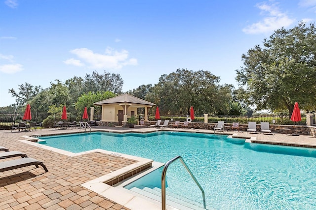 31754 Red Tail Blvd, Sorrento, FL 32776 - community pool with a patio and fence