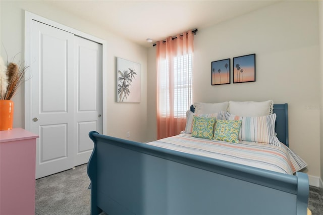 carpeted bedroom featuring a closet