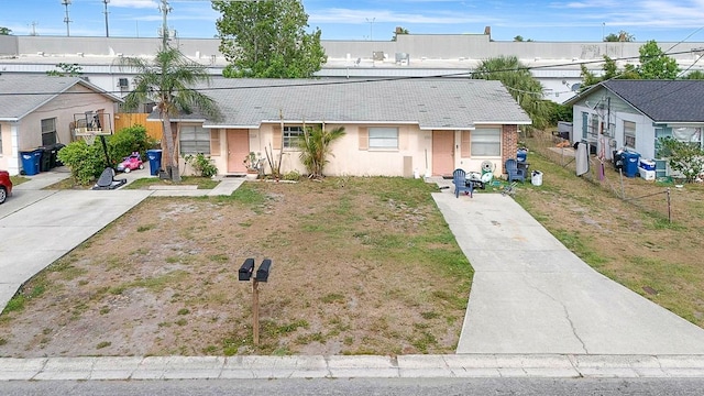 6520/6522 12th St W, Bradenton, FL 34207 - view of front facade featuring stucco siding, driveway, and a residential view