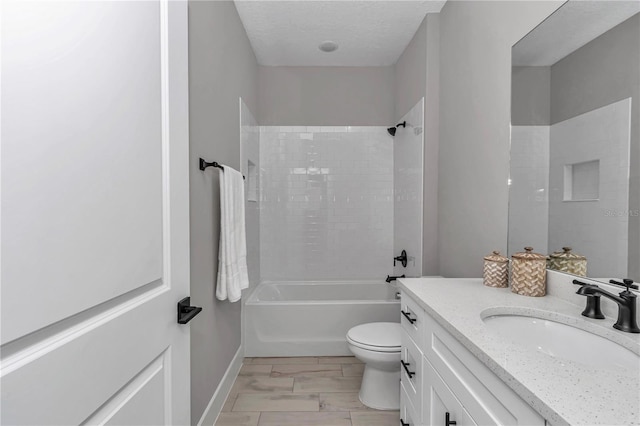 8202 SW 123rd Ter, Dunnellon, FL 34432 - bathroom featuring vanity, toilet,  shower combination, and baseboards