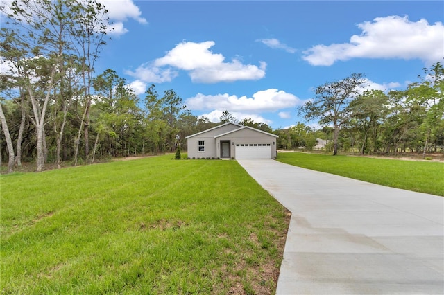 8202 SW 123rd Ter, Dunnellon, FL 34432 - view of front of home featuring driveway, a front yard, and an attached garage