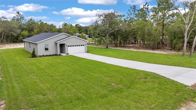 8202 SW 123rd Ter, Dunnellon, FL 34432 - view of front of house featuring a front yard, driveway, and an attached garage