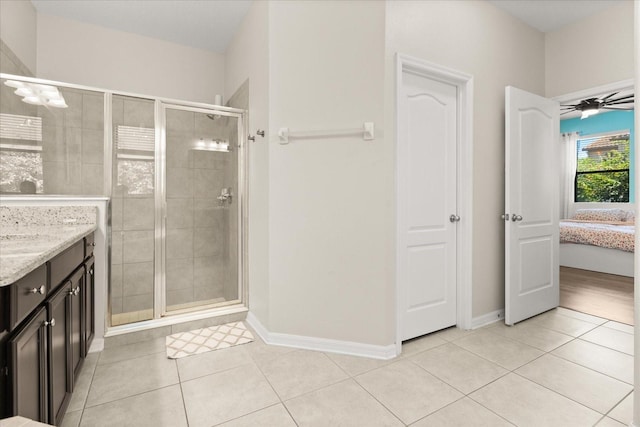 1501 Prairie Oaks Dr, Saint Cloud, FL 34771 - ensuite bathroom featuring a stall shower, tile patterned floors, and vanity