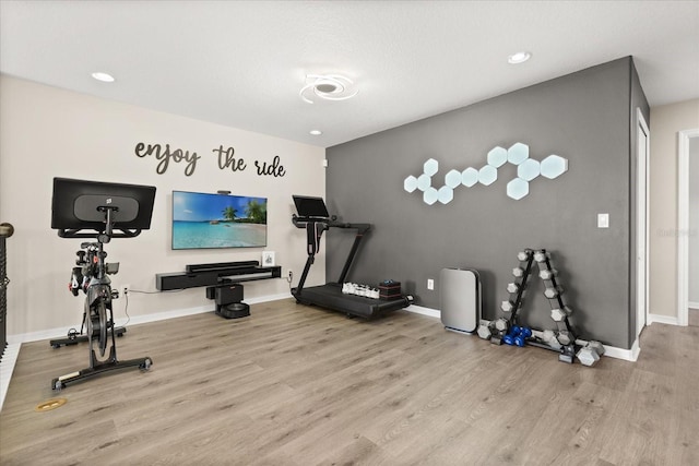 1501 Prairie Oaks Dr, Saint Cloud, FL 34771 - exercise area featuring wood finished floors, baseboards, and recessed lighting