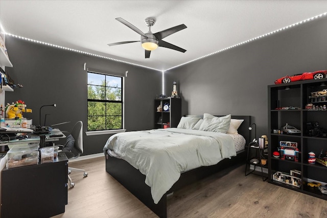1501 Prairie Oaks Dr, Saint Cloud, FL 34771 - bedroom featuring wood finished floors and ceiling fan