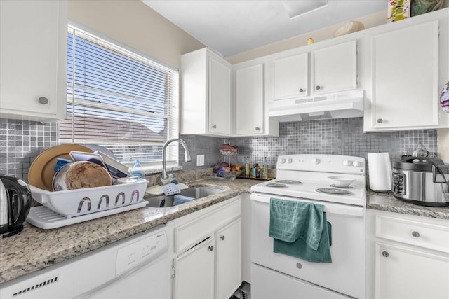 4160 Pershing Pointe Pl Unit 4, Orlando, FL 32822 - kitchen featuring white appliances, under cabinet range hood, a sink, and white cabinets