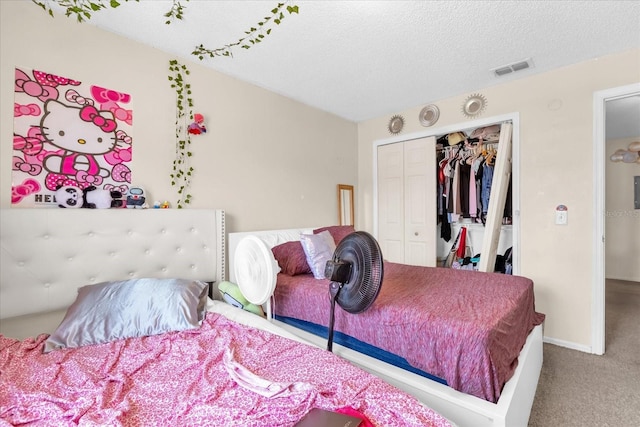 4160 Pershing Pointe Pl Unit 4, Orlando, FL 32822 - bedroom with a closet, carpet floors, a textured ceiling, and baseboards